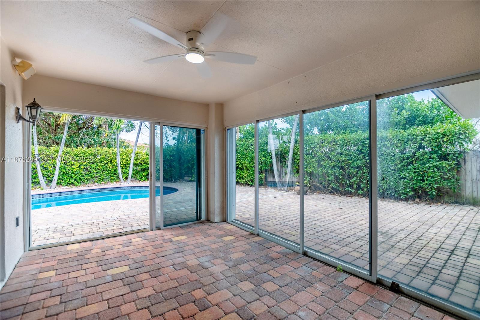16335 Southwest 93rd Street Miami, FL 33196 - Photo 61 of 70 a view of a large window with an outdoor space