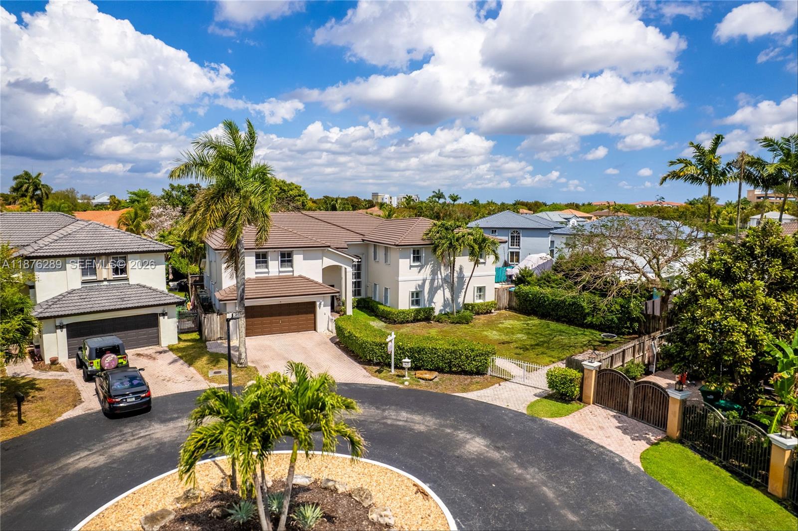 16335 Southwest 93rd Street Miami, FL 33196 - Photo 67 of 70 a view of a street with cars parked