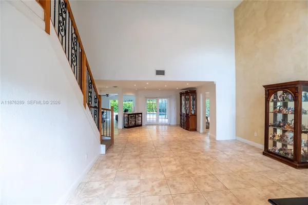 a view of entryway with stairs