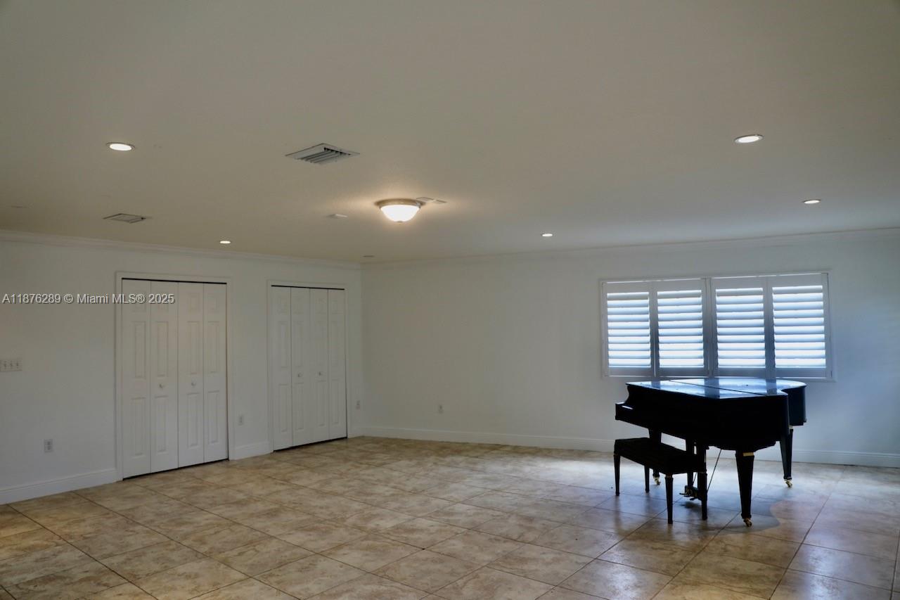 16335 Southwest 93rd Street Miami, FL 33196 - Photo 8 of 29 a view of a room with furniture window and wooden floor