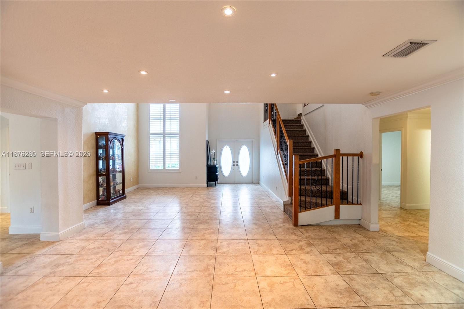 16335 Southwest 93rd Street Miami, FL 33196 - Photo 9 of 70 a view of entryway with stairs