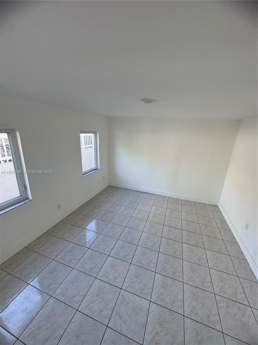 3021 Southwest 2nd Avenue Miami, FL 33129 - Photo 17 of 29 a view of an empty room and window