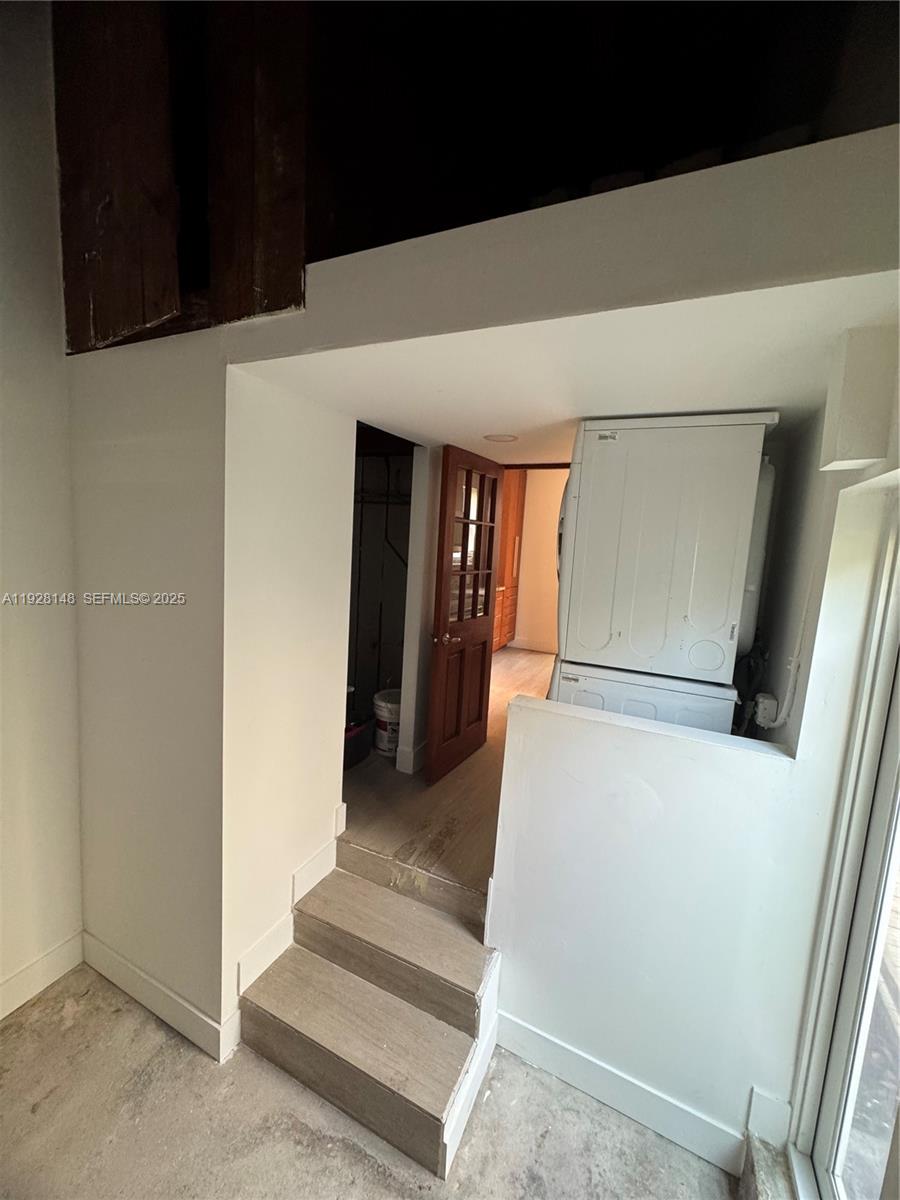 3021 Southwest 2nd Avenue Miami, FL 33129 - Photo 21 of 29 a view of a hallway with wooden floor and staircase