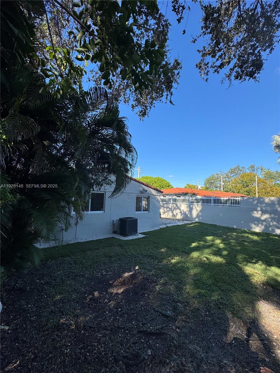 3021 Southwest 2nd Avenue Miami, FL 33129 - Photo 28 of 29 a view of a house with a yard