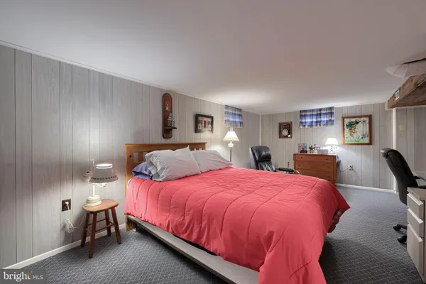 a bed room with a bed and a couch