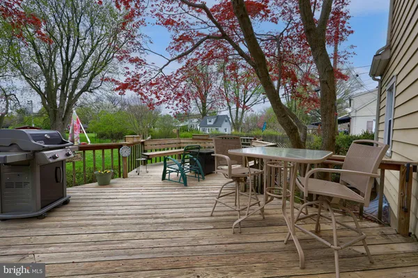 a view of a chairs and tables in the patio