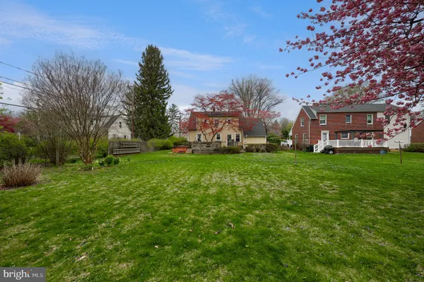 a view of a house with a back yard