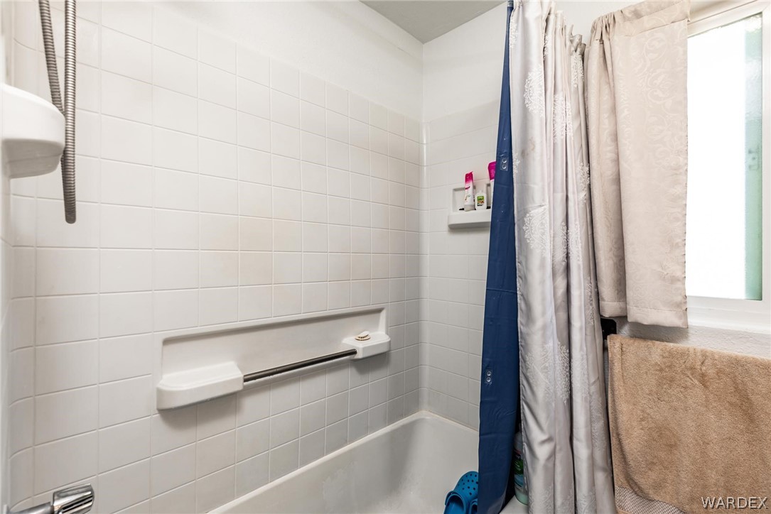 3535 Mobile Road Golden Valley, AZ 86413 - Photo 15 of 37 a bathroom with a shower