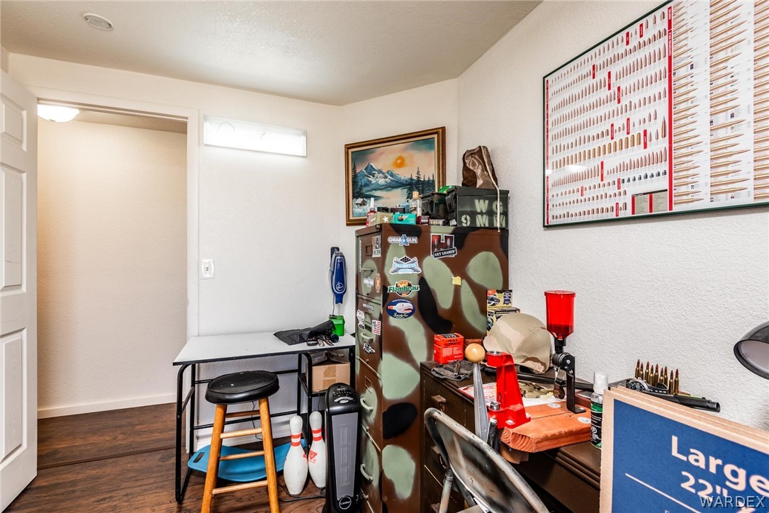 3535 Mobile Road Golden Valley, AZ 86413 - Photo 17 of 37 a room with furniture and wooden floor