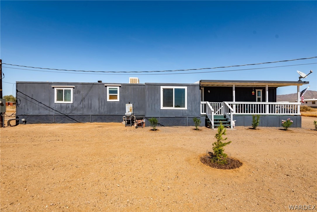 3535 Mobile Road Golden Valley, AZ 86413 - Photo 2 of 37 a view of a house with pool table and chairs