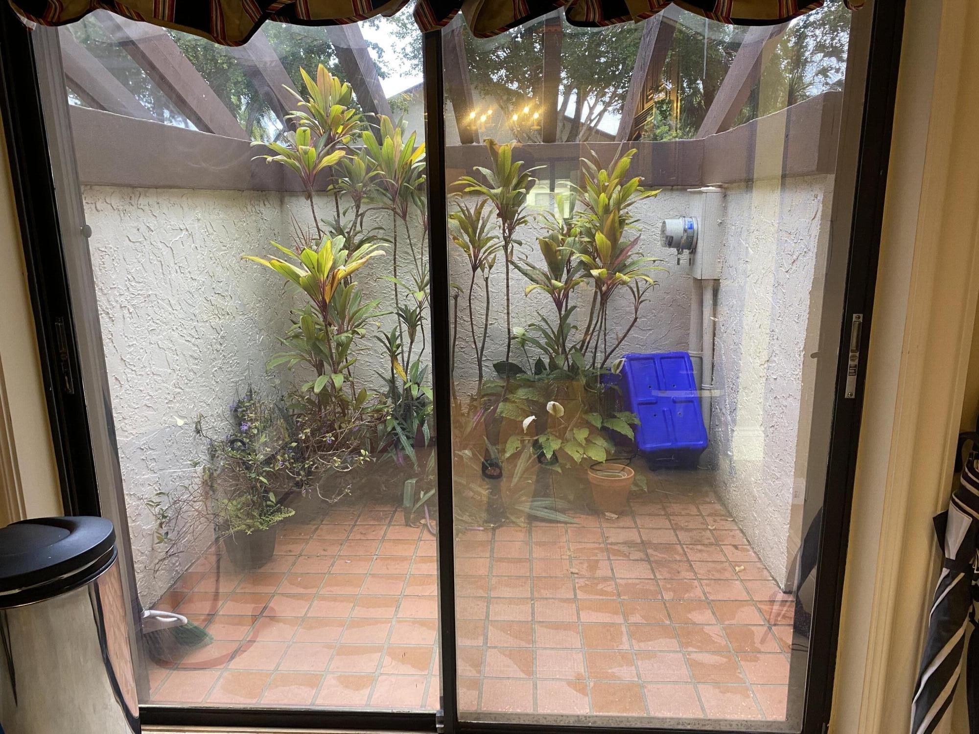 3584 Wash Road, Unit A Lake Worth, FL 33467 - Photo 21 of 31 Atrium off Kitchen