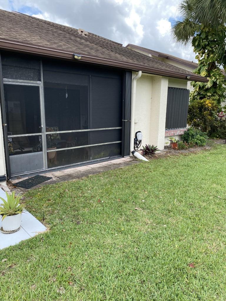 3584 Wash Road, Unit A Lake Worth, FL 33467 - Photo 27 of 31 Back of villa