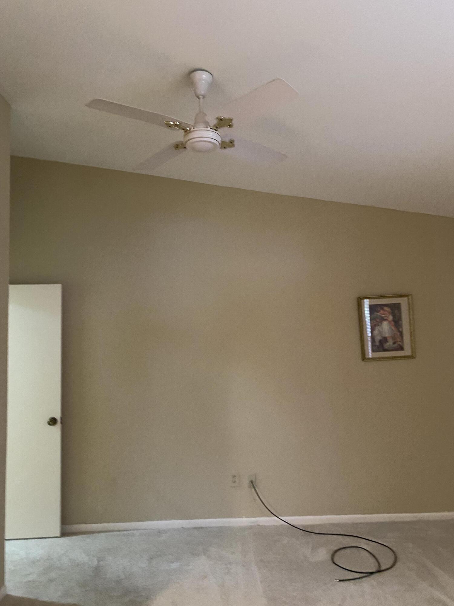 3584 Wash Road, Unit A Lake Worth, FL 33467 - Photo 6 of 31 master bedroom with fan