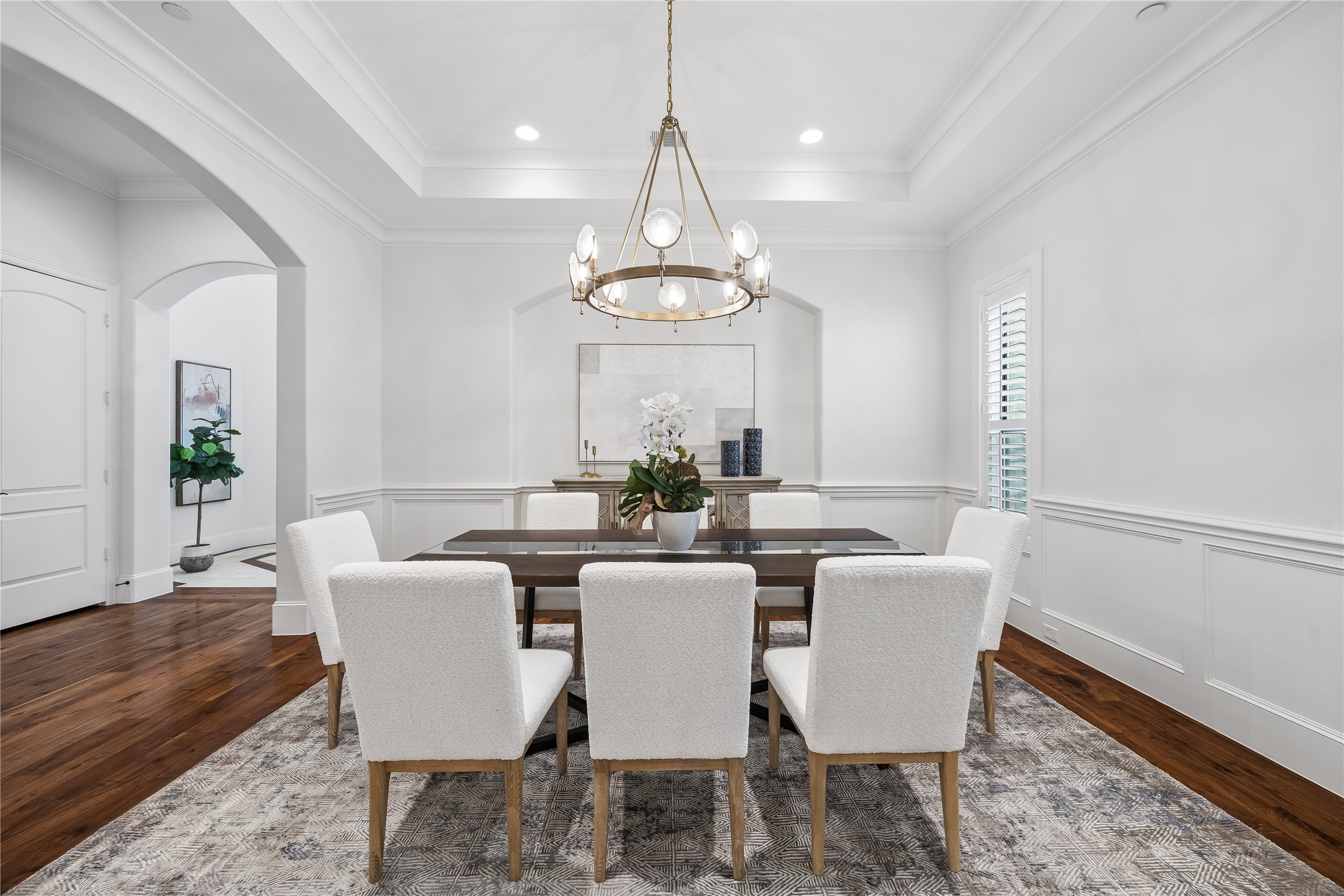 4511 Merrie Lane Bellaire, TX 77401 - Photo 15 of 49 a view of a dining room with furniture window and wooden floor