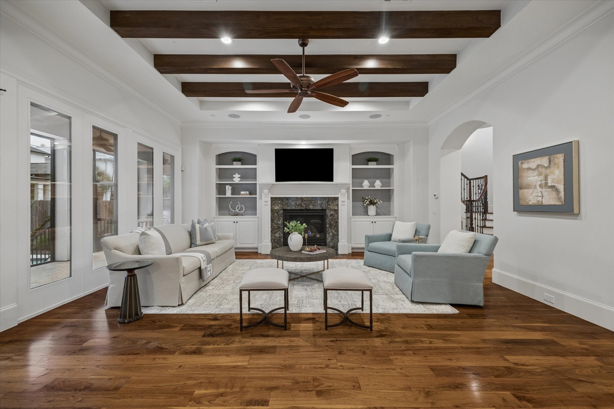 4511 Merrie Lane Bellaire, TX 77401 - Photo 2 of 49 a living room with fireplace furniture and a flat screen tv