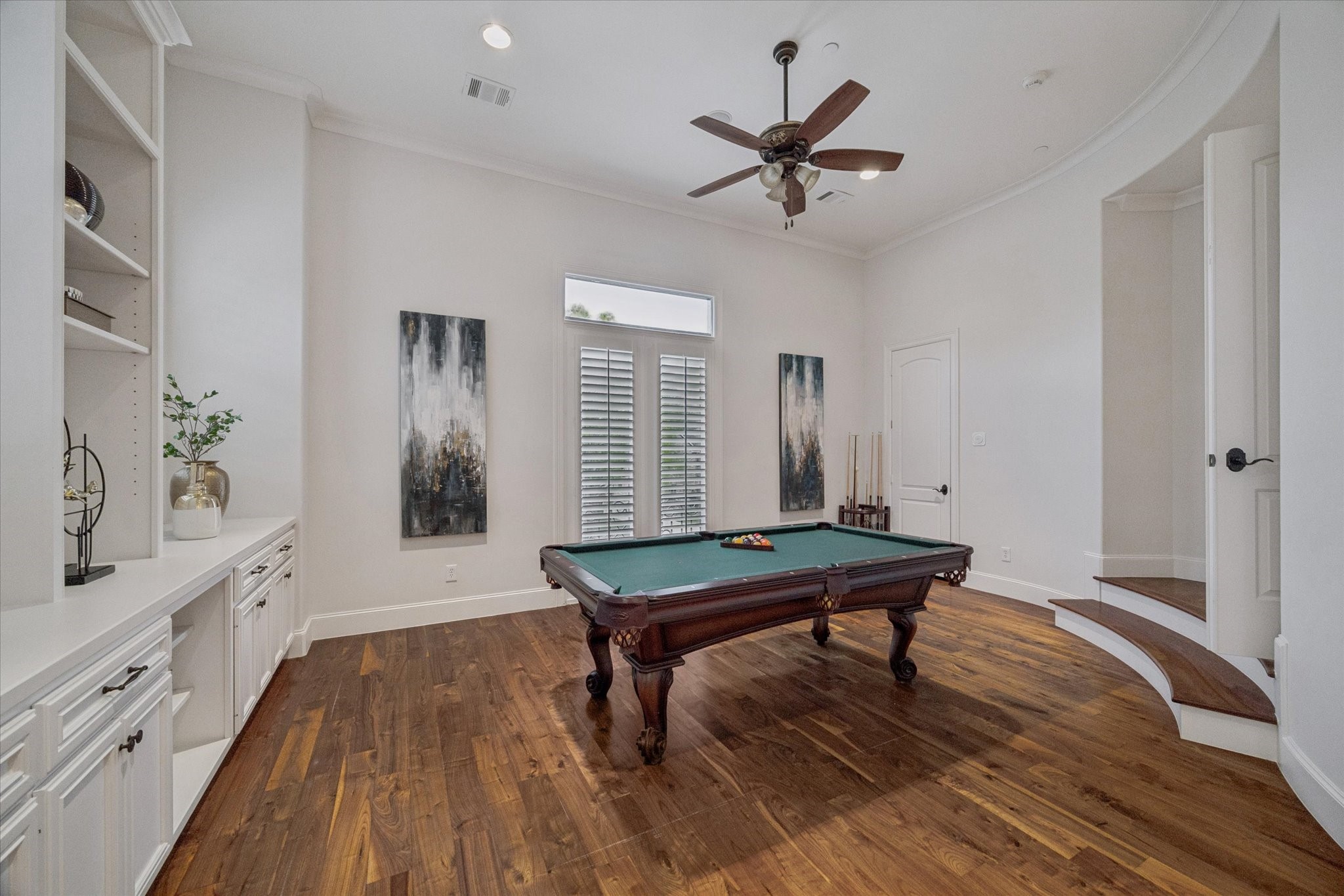 4511 Merrie Lane Bellaire, TX 77401 - Photo 28 of 49 a room with wooden floor pool table and windows
