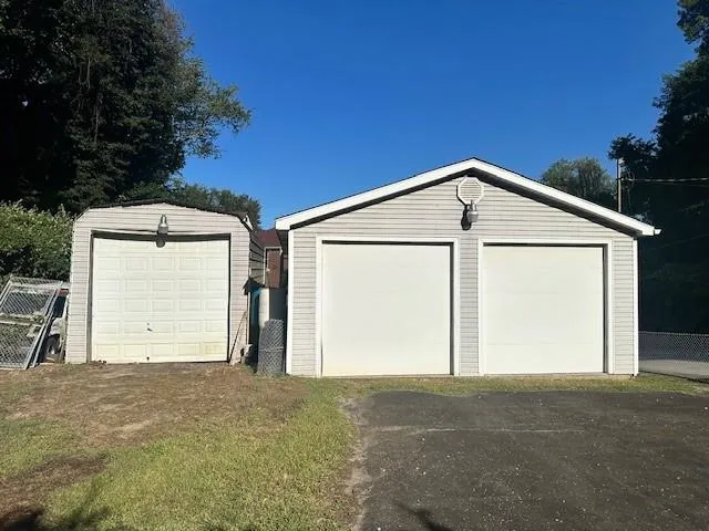 a front view of house with garage
