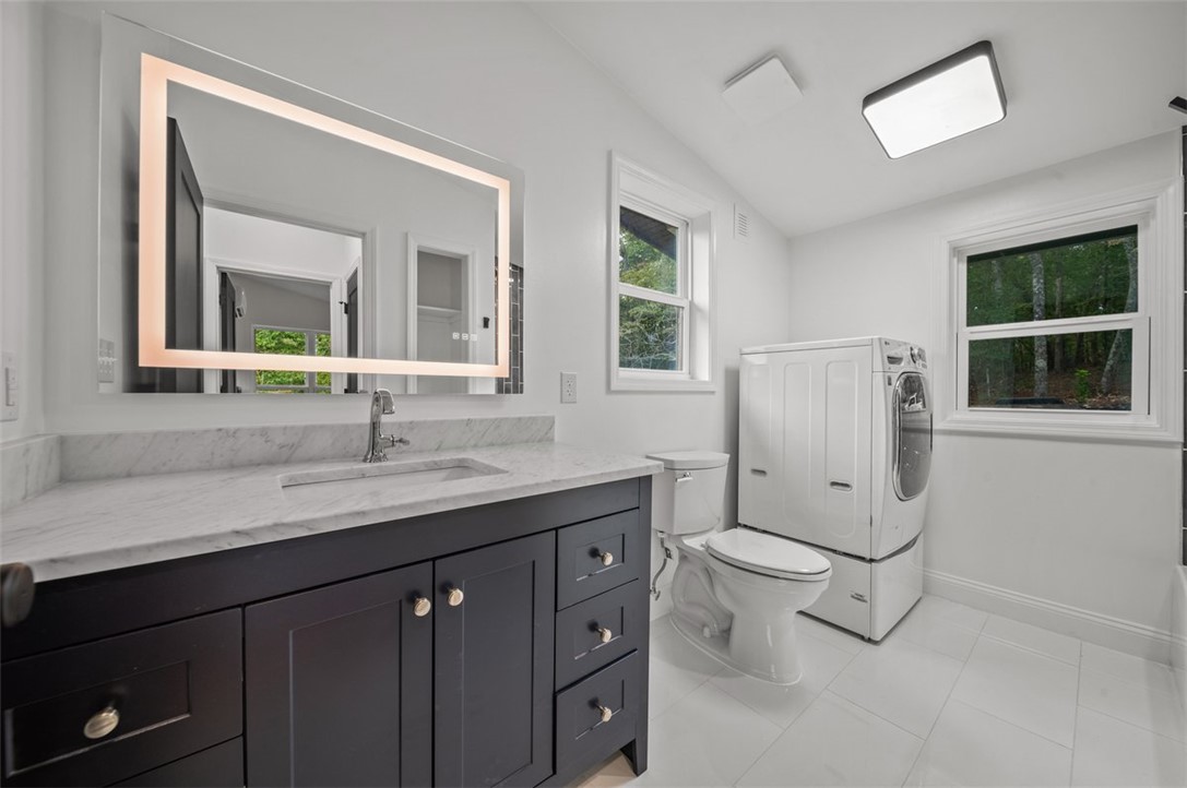 1258 Cove Creek Road Pickens, SC 29671 - Photo 37 of 44 Primary bath with laundry-guest house