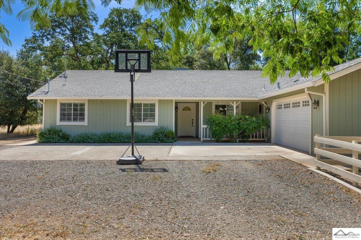 18887 Ridge Road Red Bluff, CA 96080 - Photo 2 of 48 a house view with a garden space