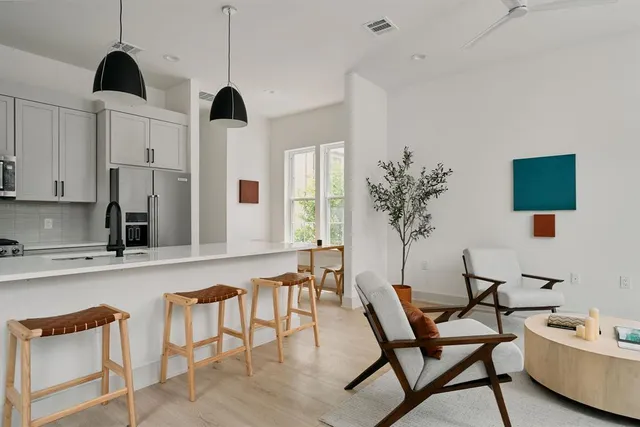 a view of kitchen with furniture and window
