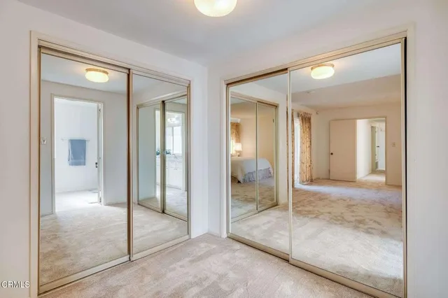 a view of a bathroom with a glass shower door
