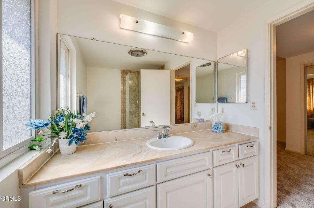 1906 Vía Del Rey South Pasadena, CA 91030 - Photo 16 of 22 a bathroom with a sink a vanity and a mirror