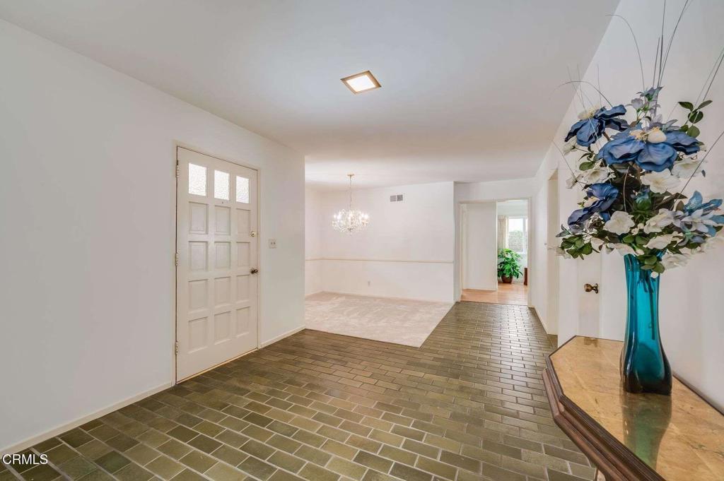 1906 Vía Del Rey South Pasadena, CA 91030 - Photo 2 of 22 a view of entryway with window and wooden floor