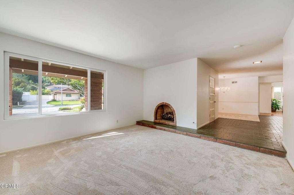 1906 Vía Del Rey South Pasadena, CA 91030 - Photo 3 of 22 a view of a livingroom with a window and wooden floor