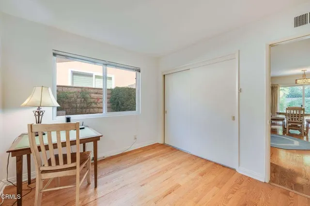 a view of a livingroom with furniture and wooden floor