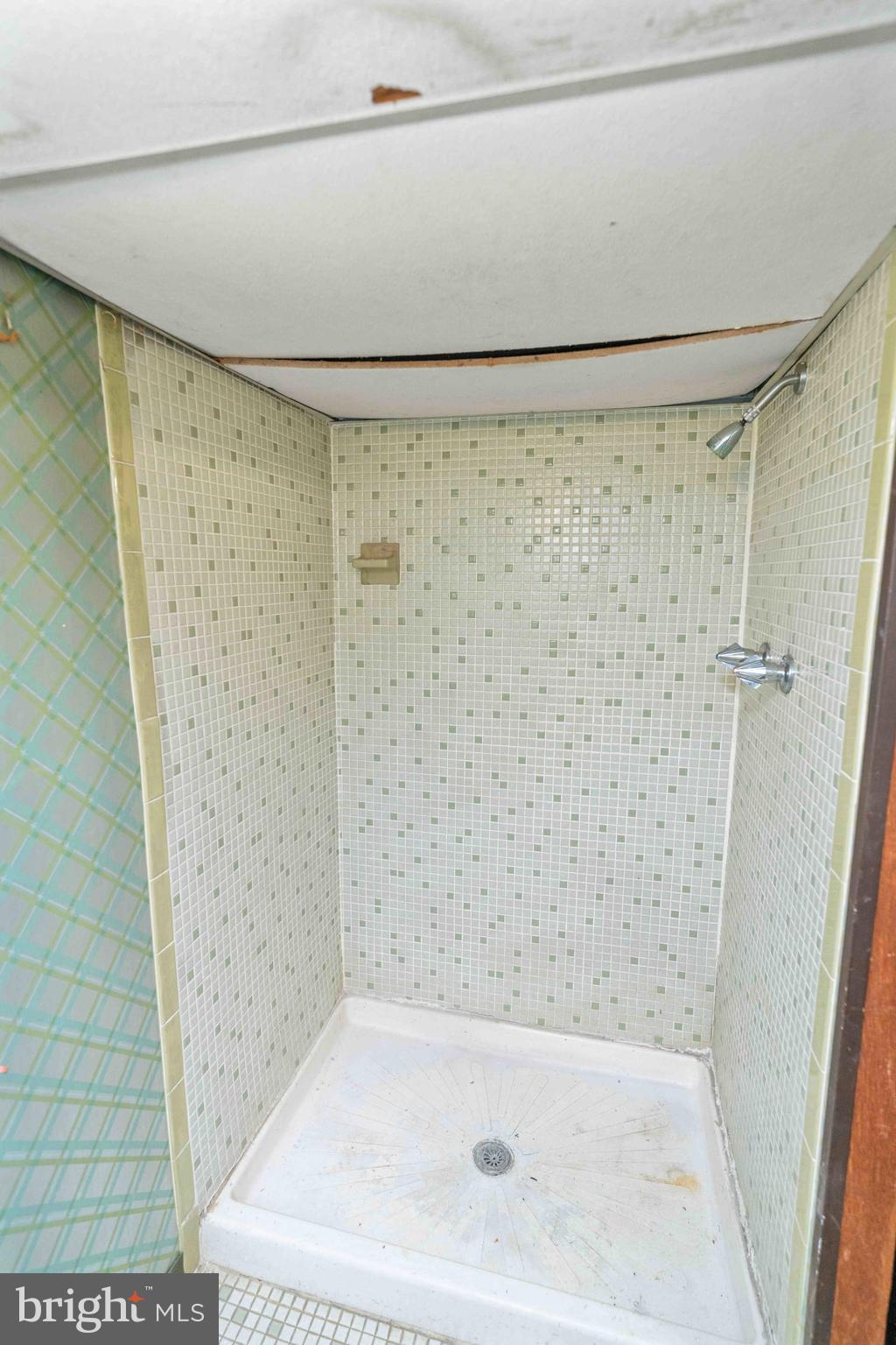 1130 Fanshawe Street Philadelphia, PA 19111 - Photo 23 of 32 a bathroom with a shower and a sink