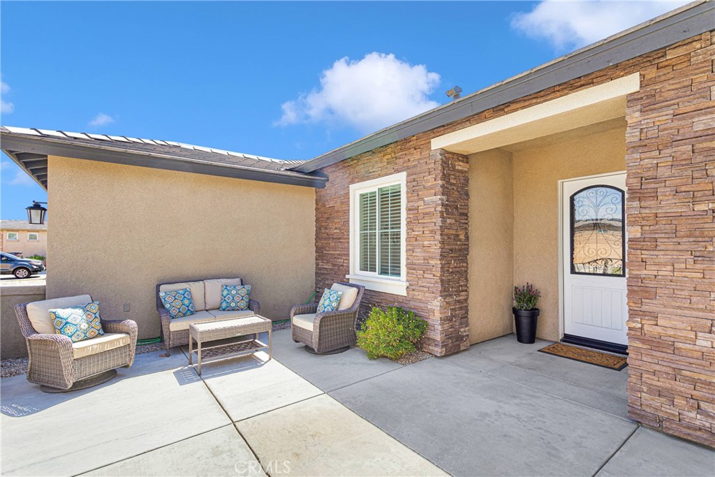 17066 Ta-Ki-Pi Road Apple Valley, CA 92307 - Photo 43 of 47 Nestled behind the courtyard wall, this space is another outdoor living area.