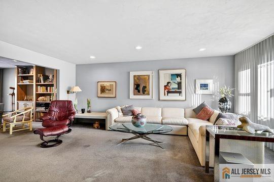 29 Darby Road East Brunswick, NJ 08816 - Photo 13 of 34 a living room with furniture a rug and a window
