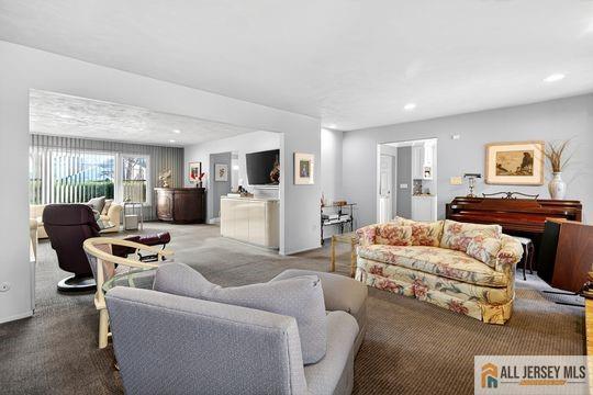29 Darby Road East Brunswick, NJ 08816 - Photo 15 of 34 a living room with furniture and a flat screen tv