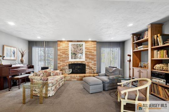 29 Darby Road East Brunswick, NJ 08816 - Photo 17 of 34 a living room with furniture and a floor to ceiling window