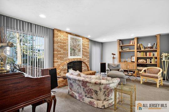 29 Darby Road East Brunswick, NJ 08816 - Photo 18 of 34 a living room with furniture and a large window
