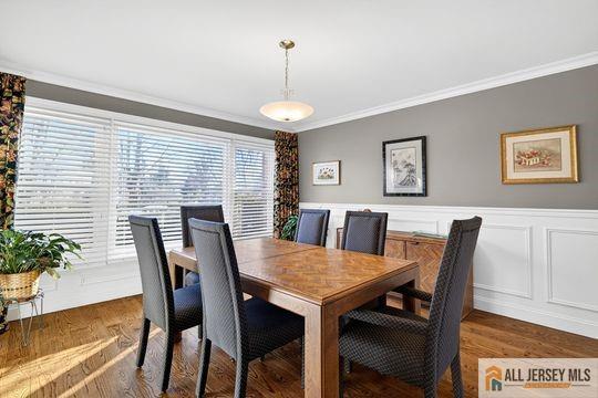29 Darby Road East Brunswick, NJ 08816 - Photo 19 of 34 a view of a dining room with furniture window and wooden floor