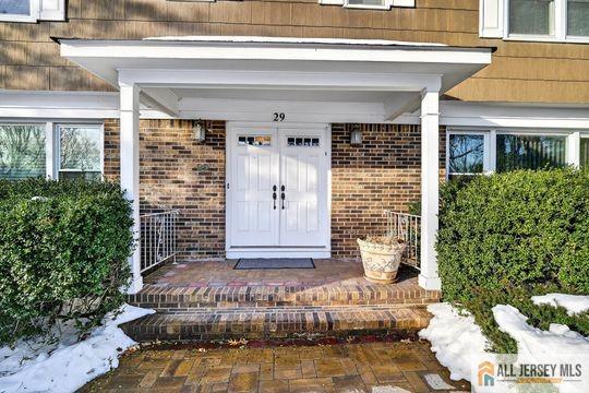 29 Darby Road East Brunswick, NJ 08816 - Photo 2 of 34 a front view of a house with a porch