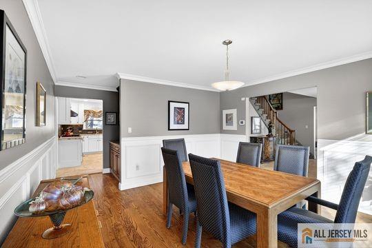 29 Darby Road East Brunswick, NJ 08816 - Photo 21 of 34 a dining room with furniture a rug and wooden floor