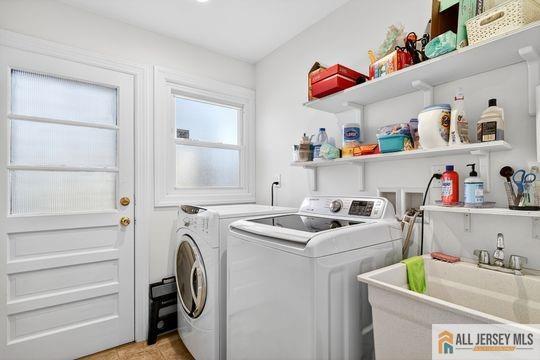 29 Darby Road East Brunswick, NJ 08816 - Photo 23 of 34 a utility room with sink dryer and washer