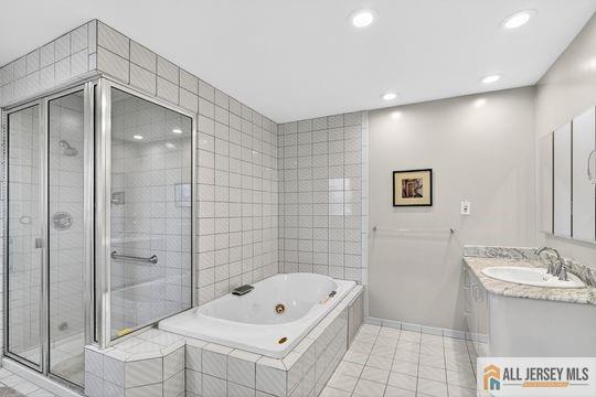 29 Darby Road East Brunswick, NJ 08816 - Photo 27 of 34 a bathroom with a tub a sink and a shower