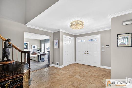 29 Darby Road East Brunswick, NJ 08816 - Photo 5 of 34 a view of a livingroom with furniture and a flat screen tv