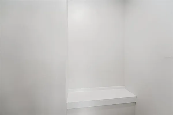 a close up of a white marble wall