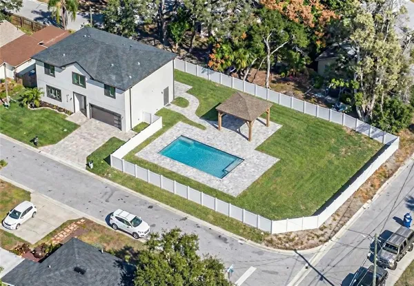an aerial view of residential house with outdoor space