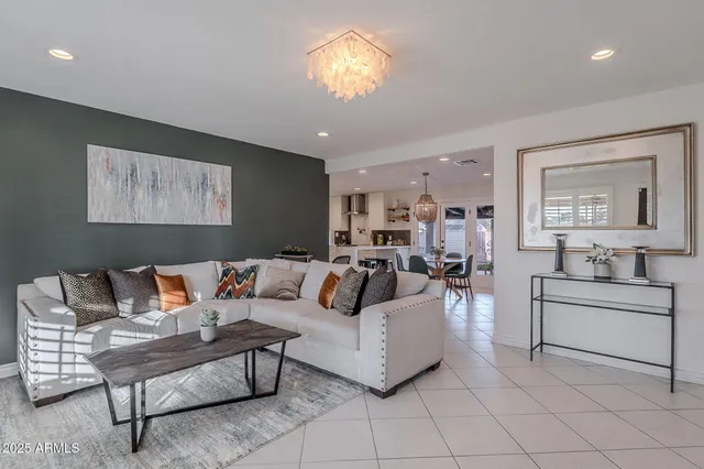 a bedroom with a bed and a night stand