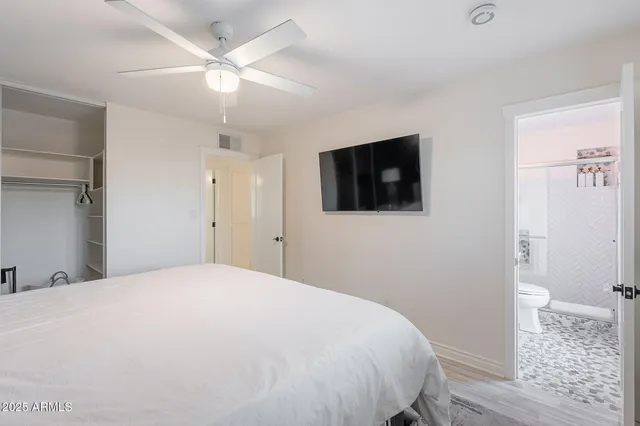 a view of a livingroom with furniture and windows