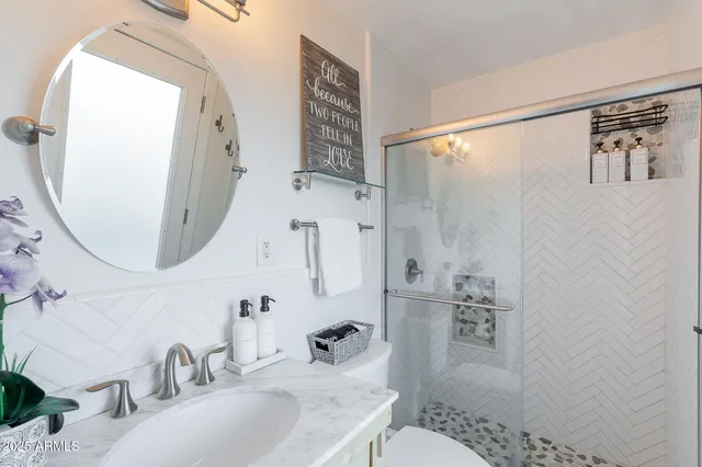 a view of a house with a yard patio and a fire pit