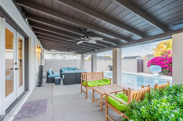 a front view of house with yard and outdoor seating