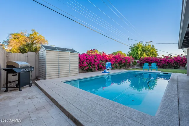 a view of a house with a swimming pool