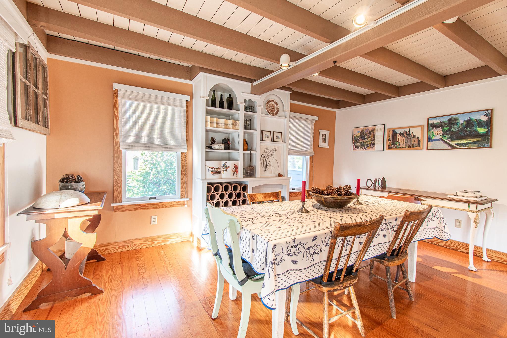 8805 Cummings Road Wittman, MD 21676 - Photo 12 of 39 a dining room with furniture and wooden floor