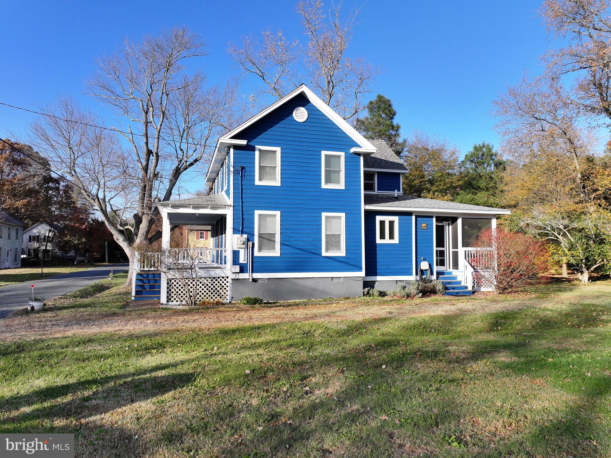 8805 Cummings Road Wittman, MD 21676 - Photo 29 of 39 a front view of a house with a yard
